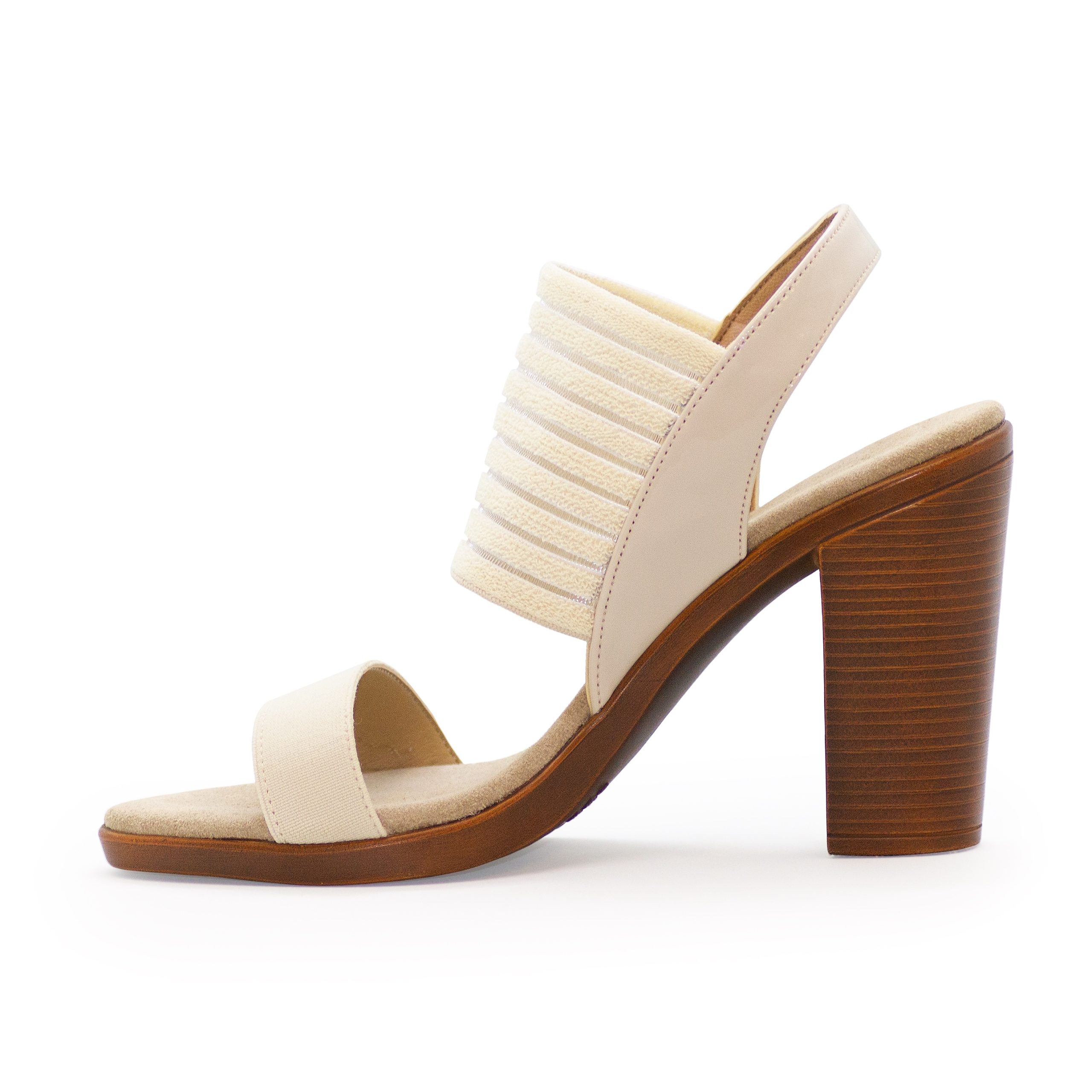 A side angle of a women's heeled sandal on a white background.