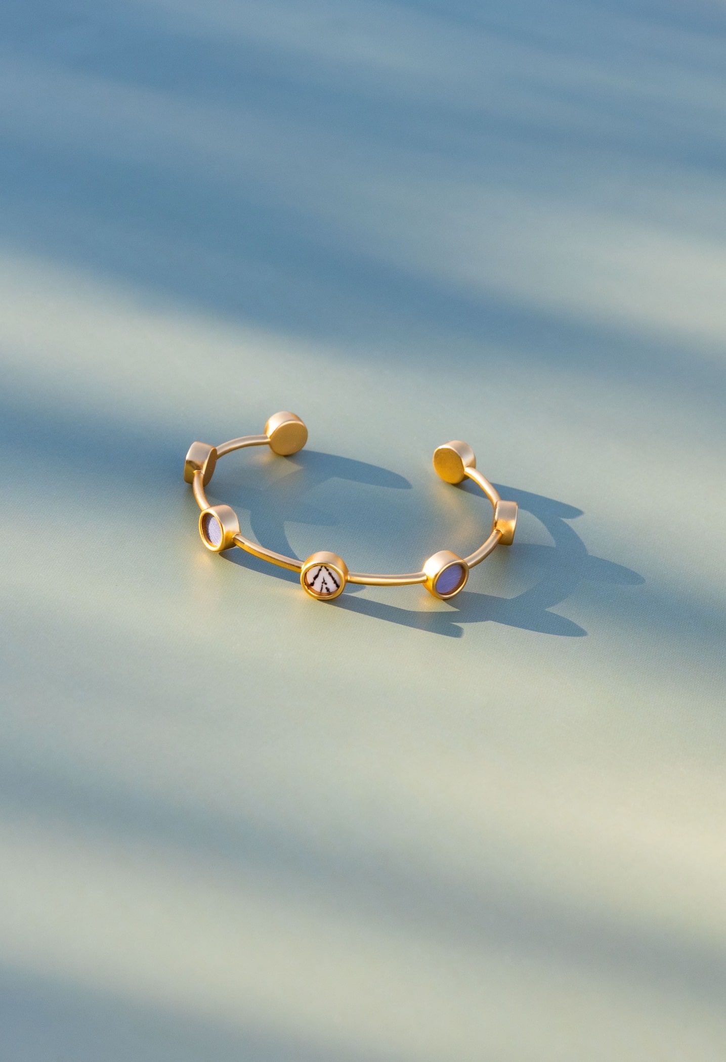 Multibezel cuff flatlay photo