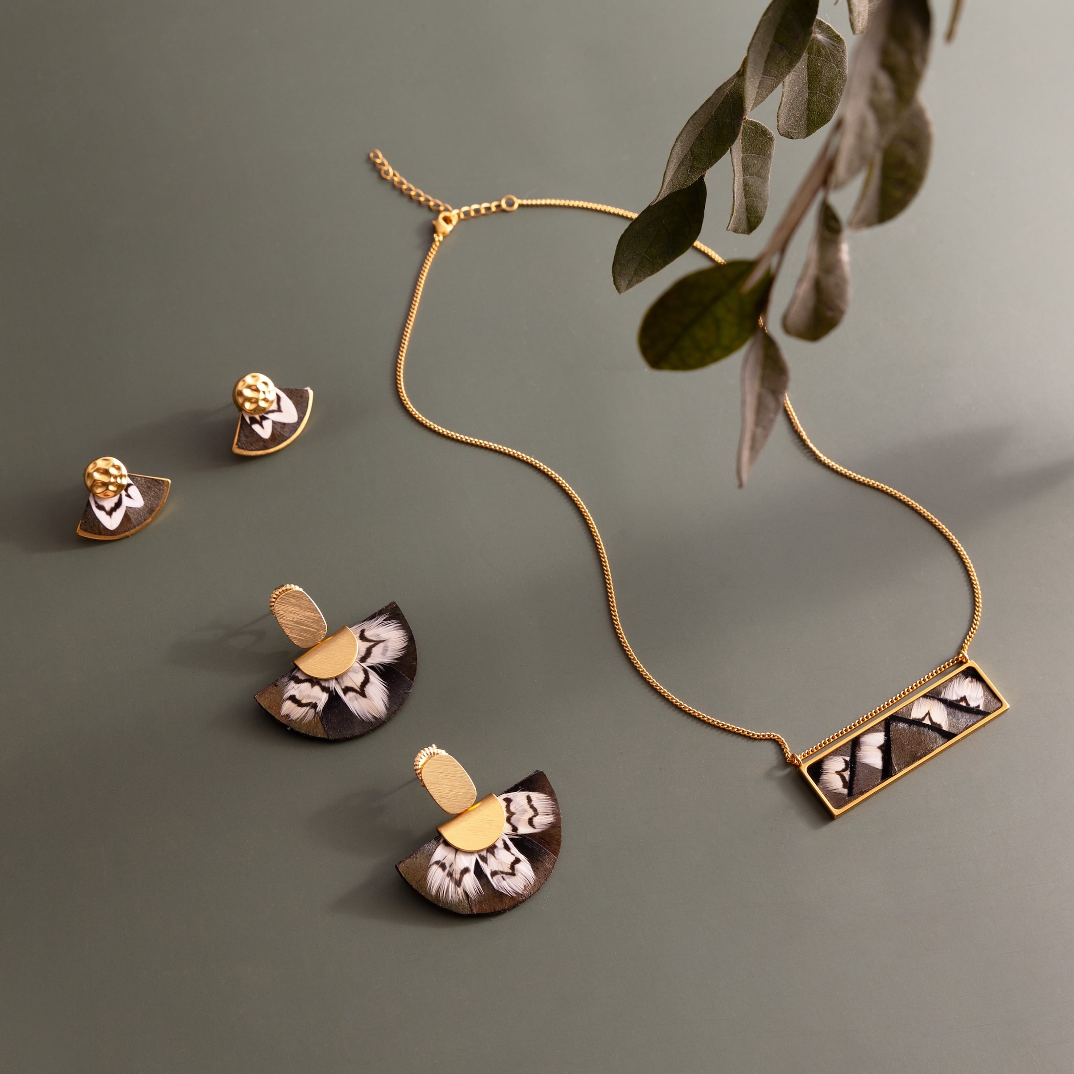 Artsy green SEWE jewelry collection shot