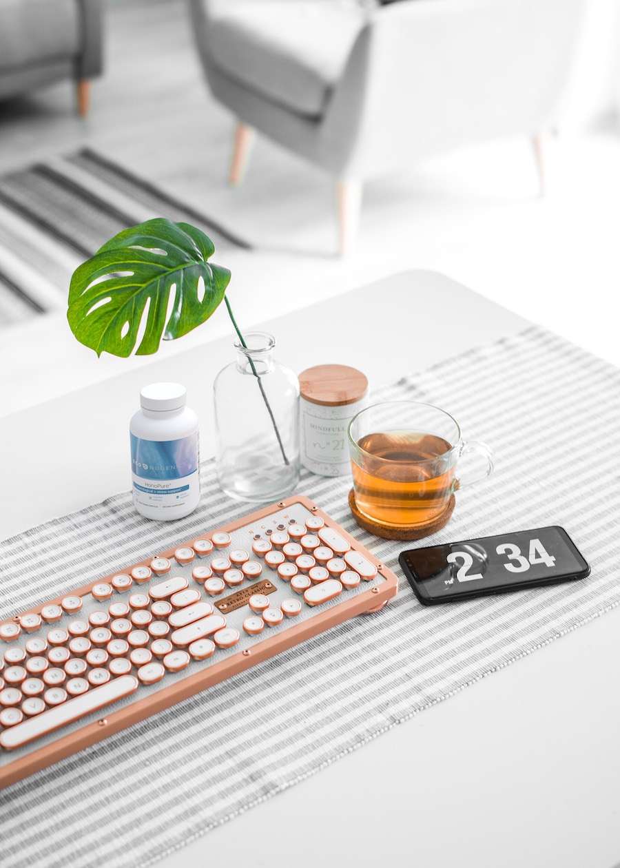 A health wellness bottle rendered into a home lifestyle photo, rendered in Adobe dimension.