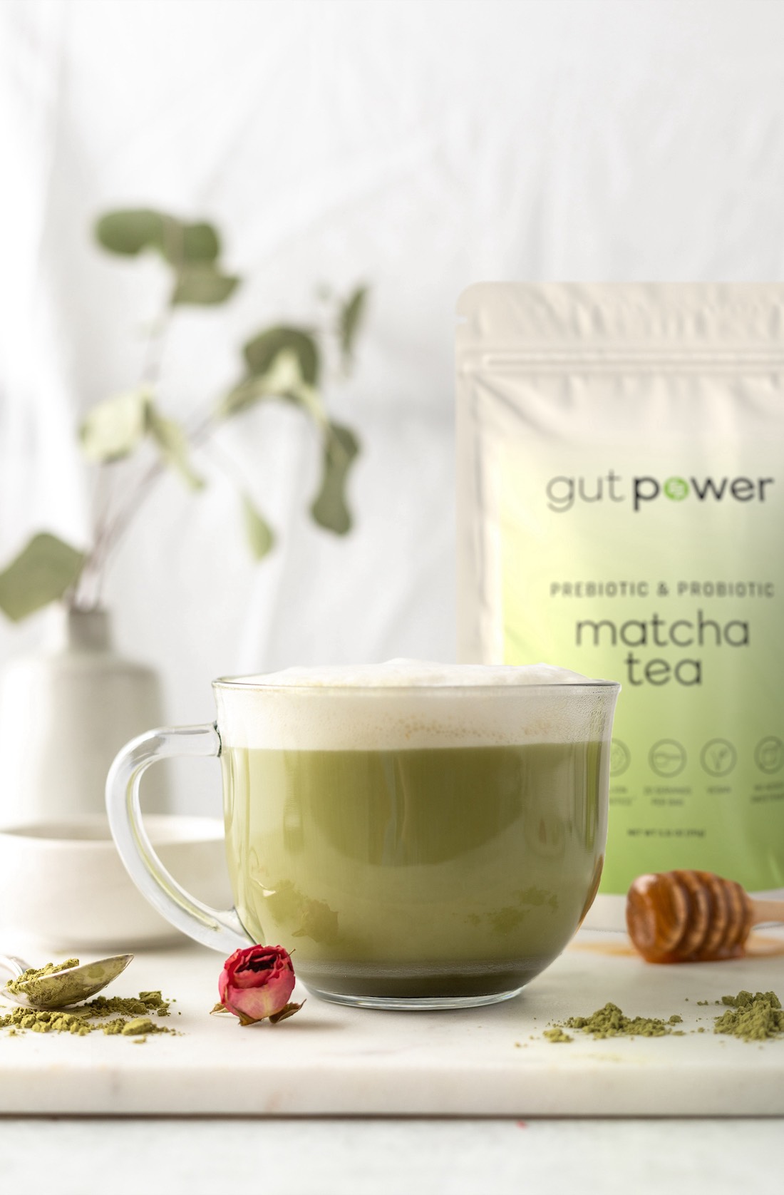 A Gut Power supplement package rendered into a lifestyle image.