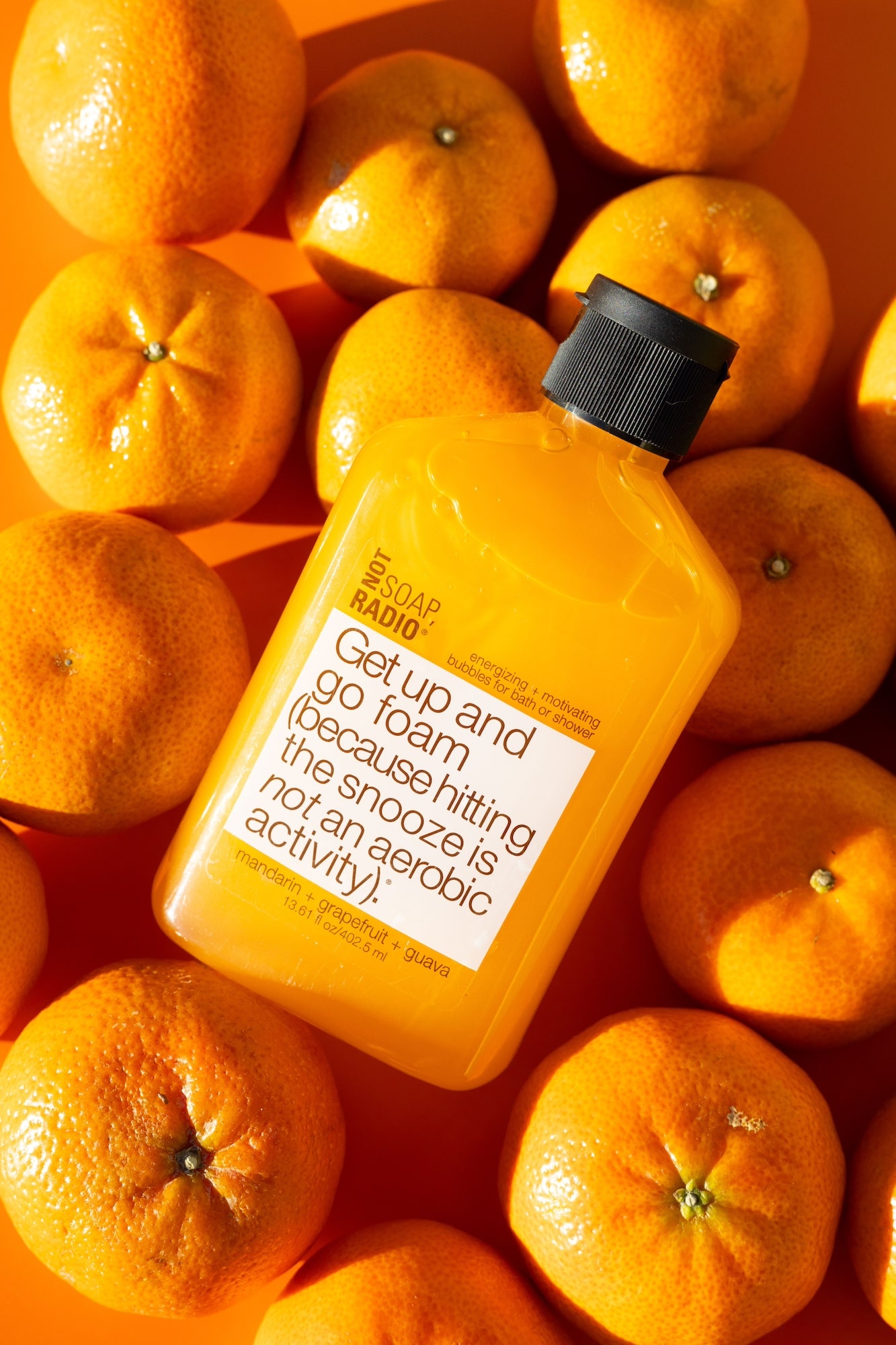 Orange themed body wash photography