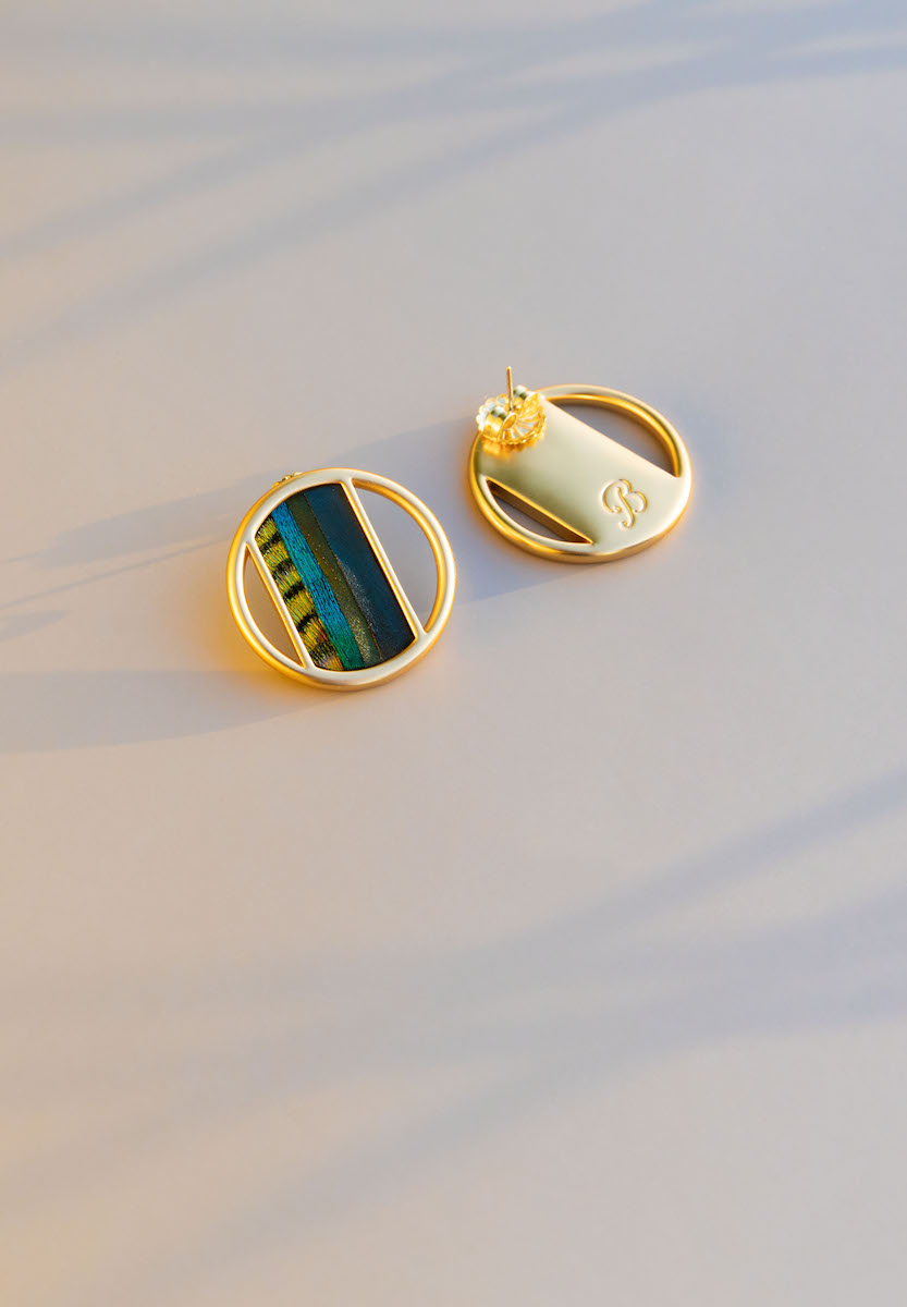 Circular stud earrings flatlay