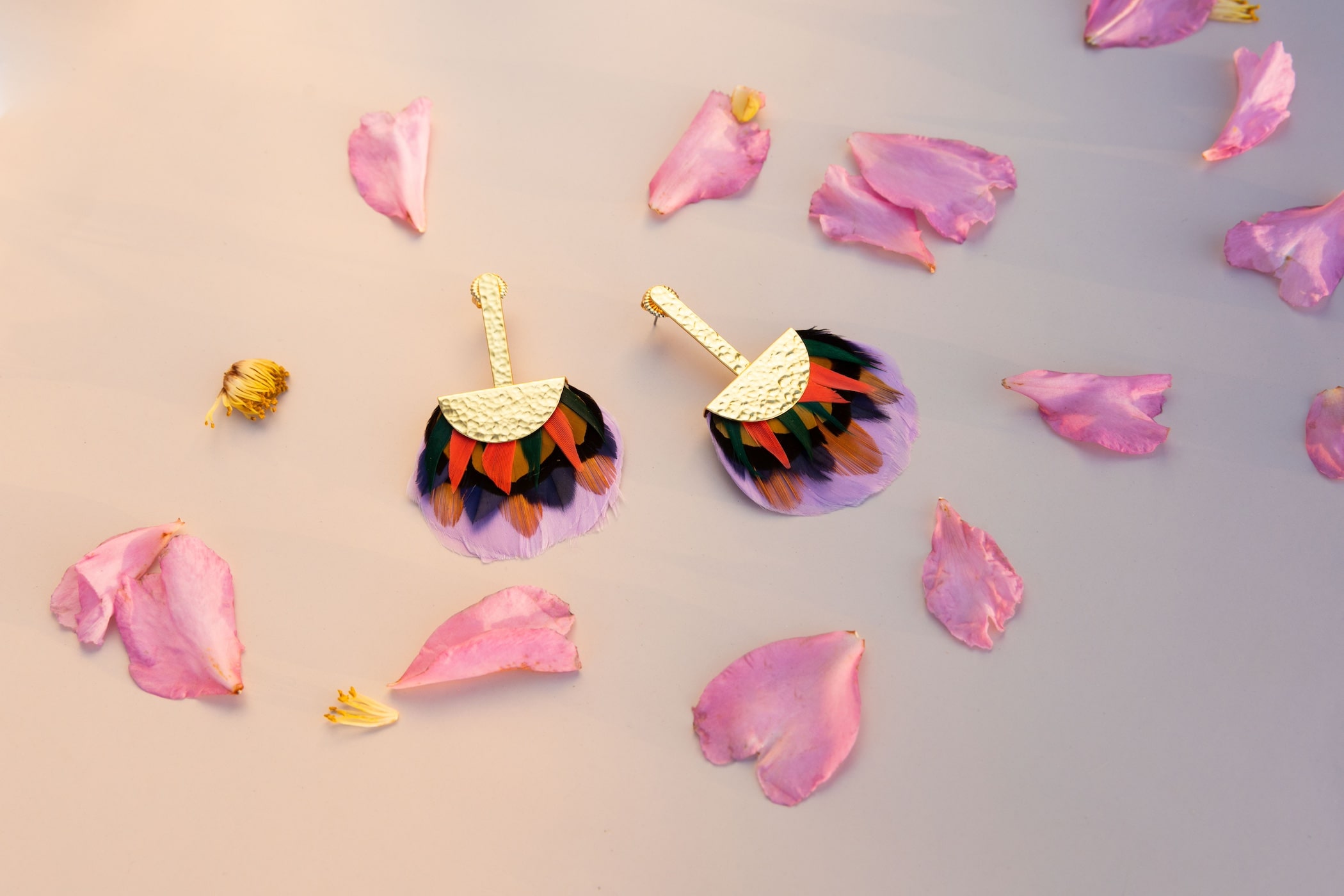 Floral earrings flatlay photography