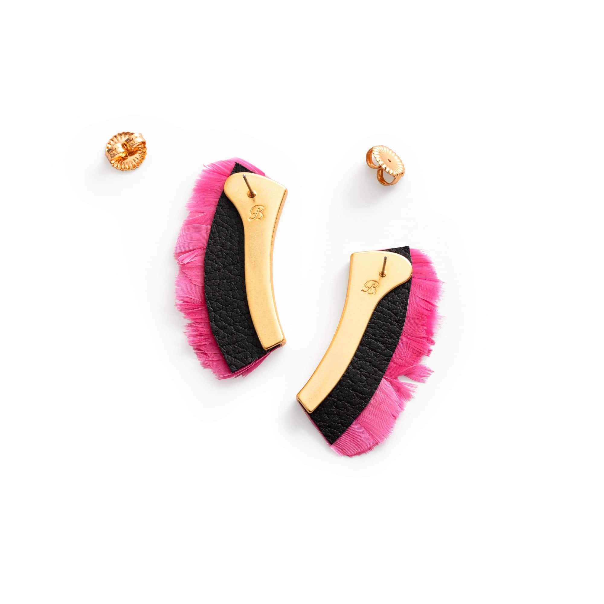 A white background product photo for a pair of pink feathered earrings by Brackish.