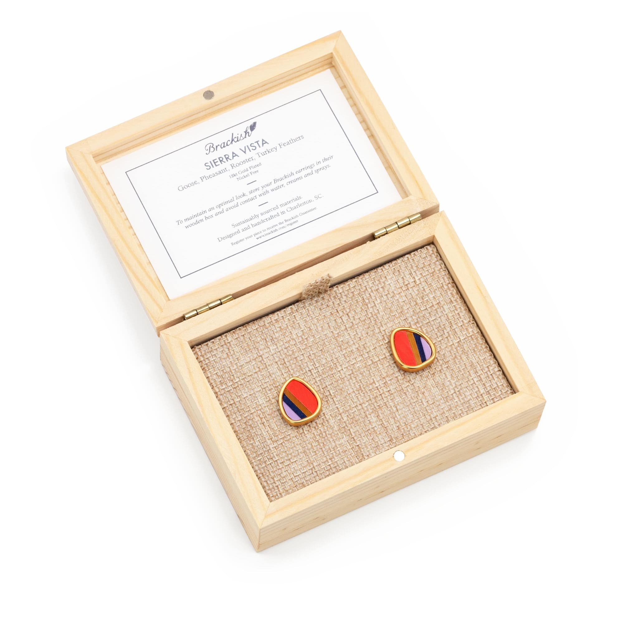 White background product photography for women's Brackish earrings with packaging.