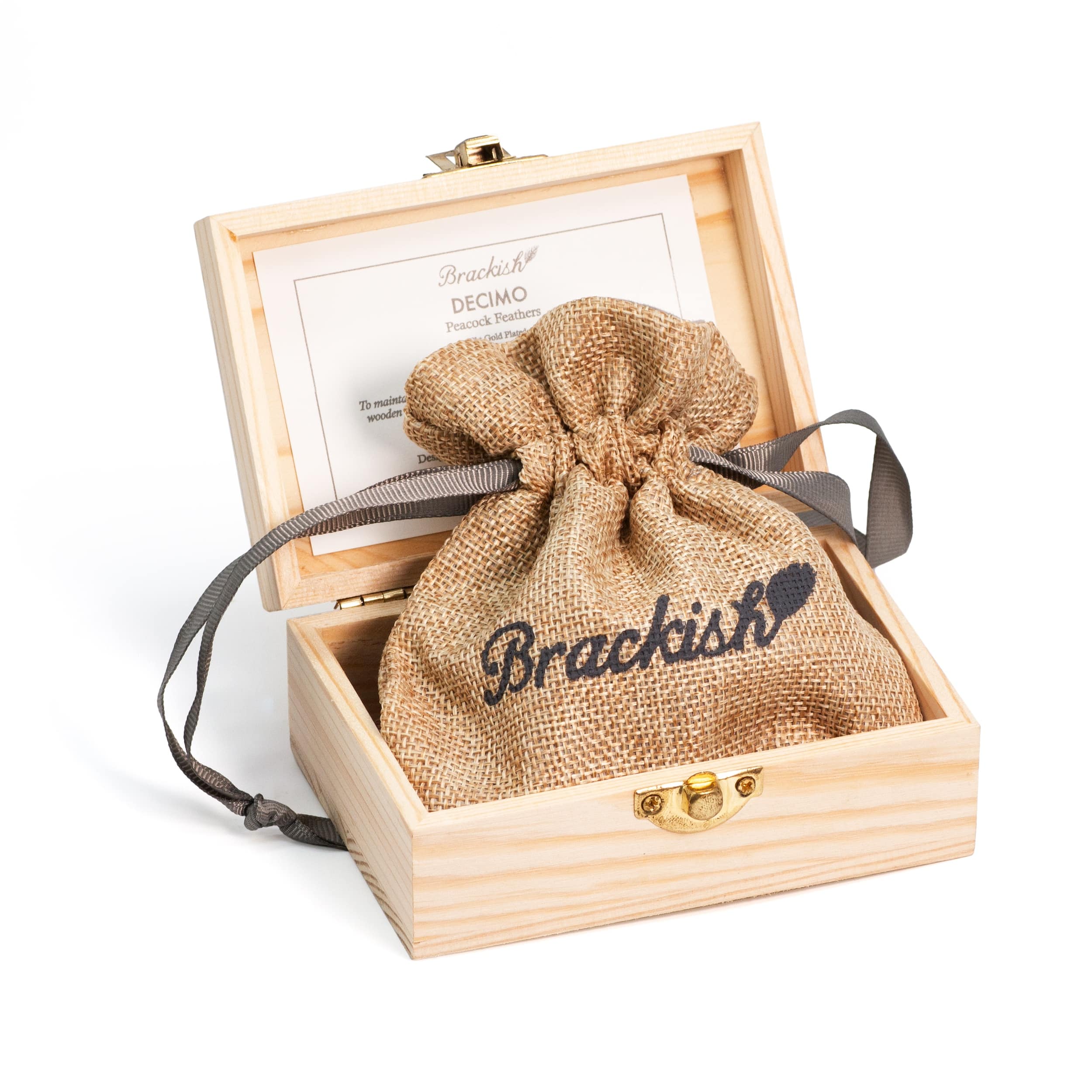 A brand's wooden packaging box opened up with a bag inside on a white background.