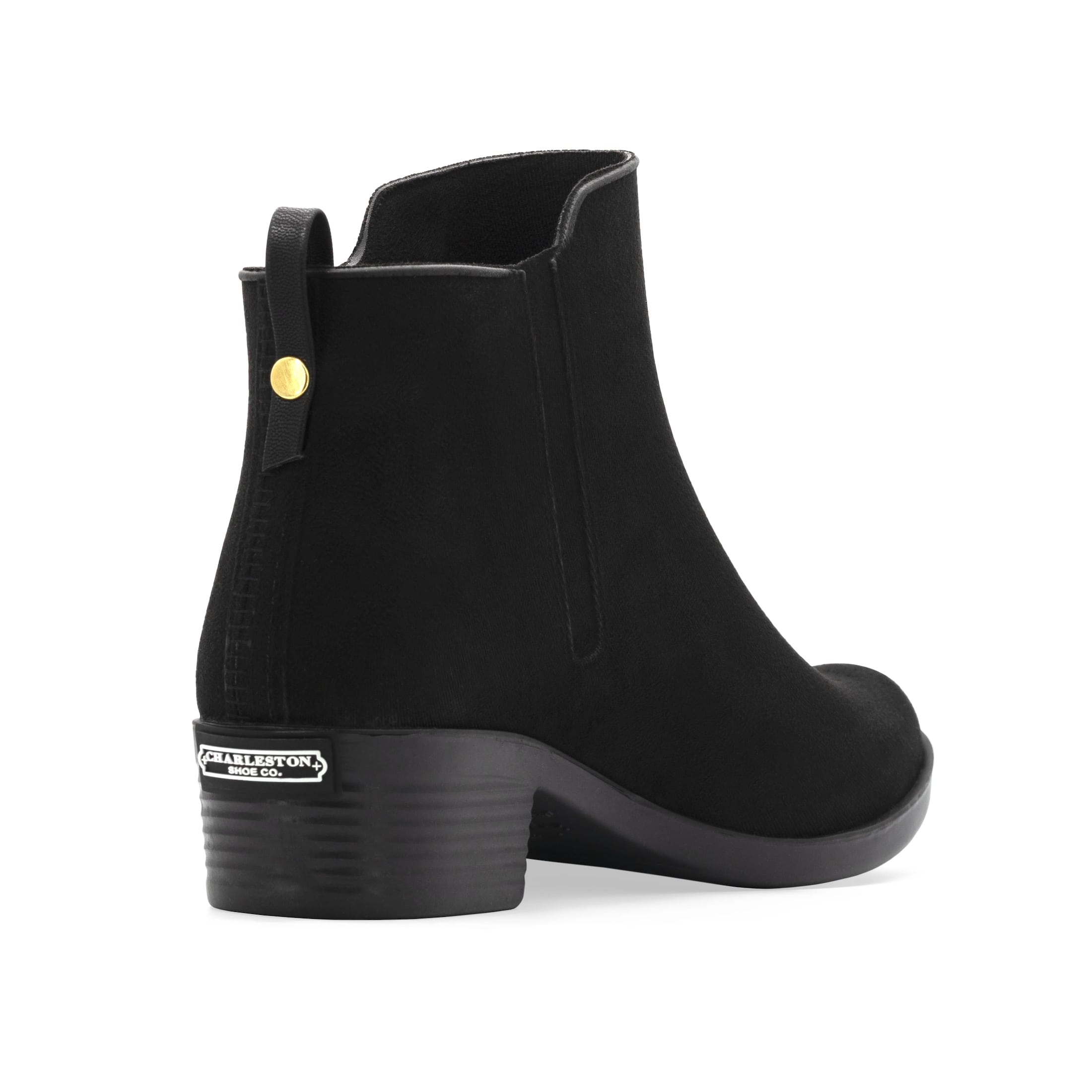 The back angle of a Charleston shoe black heeled boot.