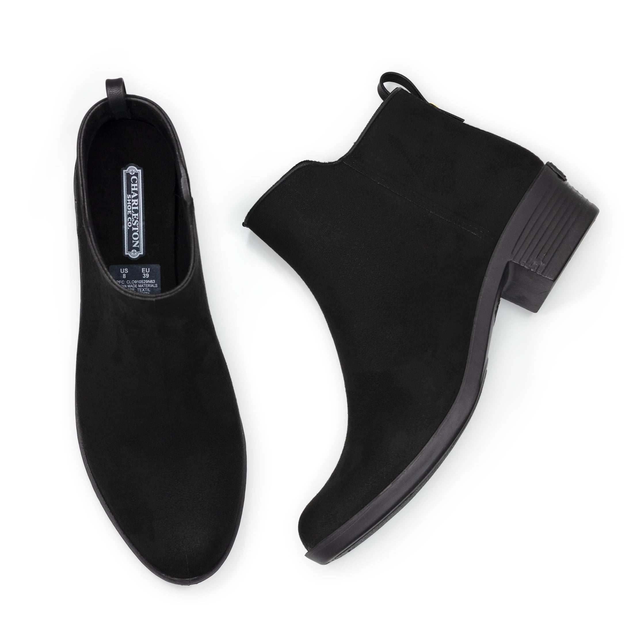 A flatlay angle of a Charleston Shoe black heeled boot.