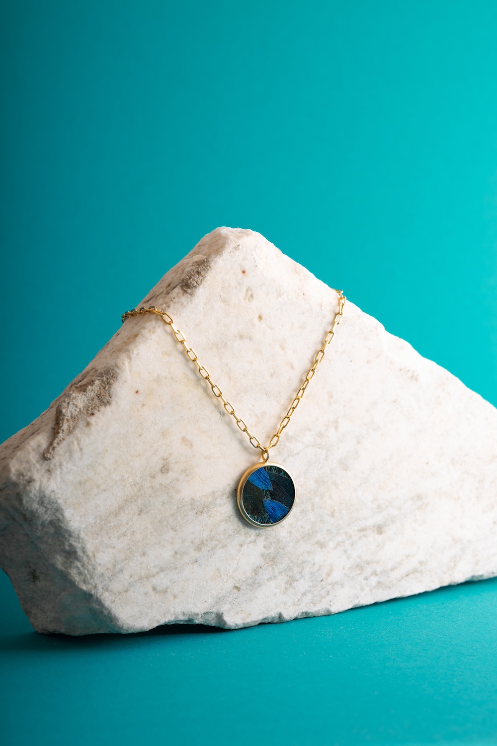 Blue necklace on stone